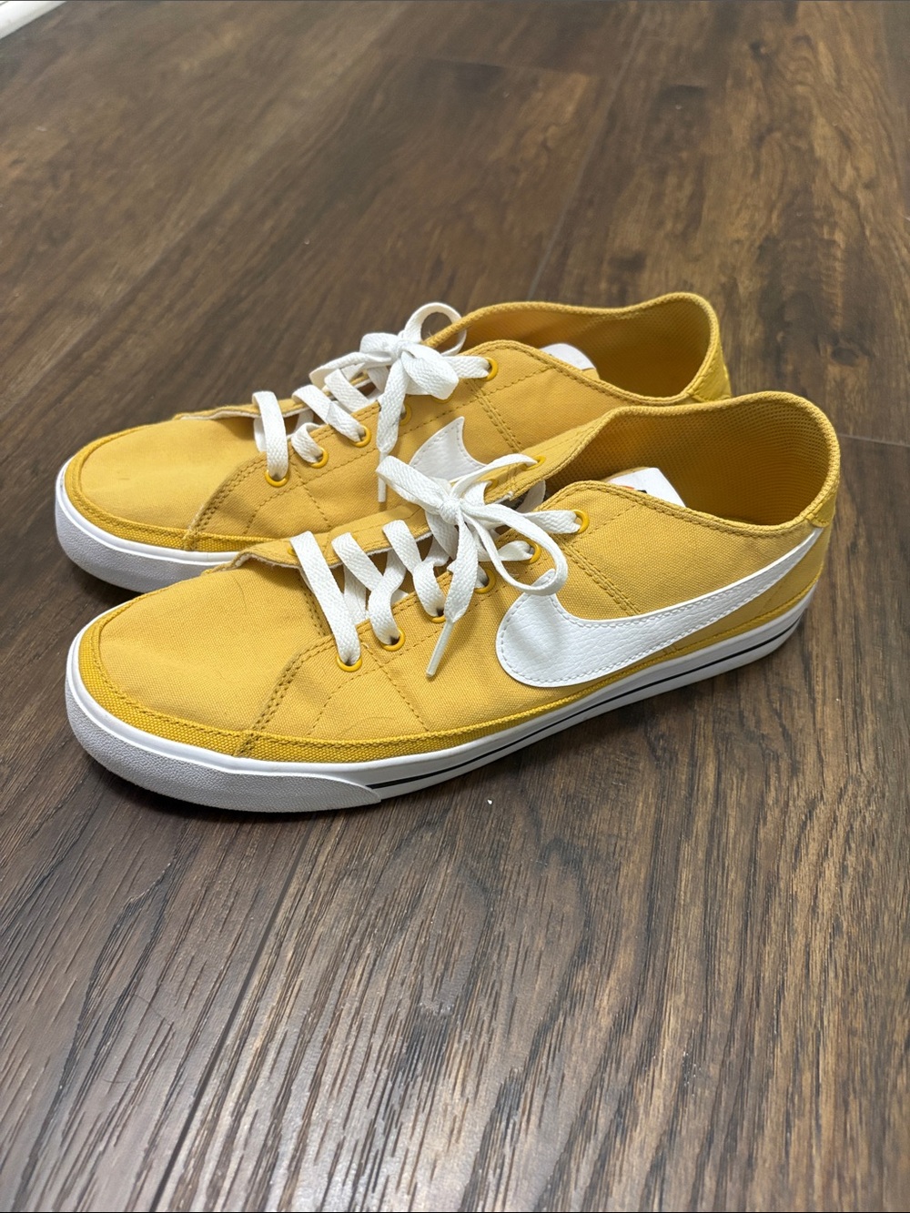 Yellow Nike Canvas Low-Top Sneakers with White Swoosh